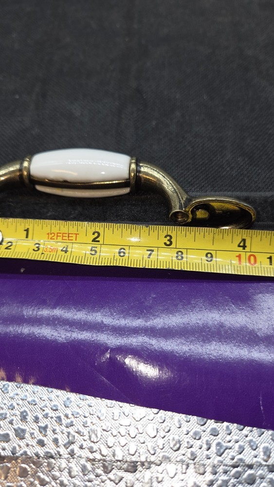 Antique Brass Deco Base Cabinet Pulls White 3 in. Center-to-Cente