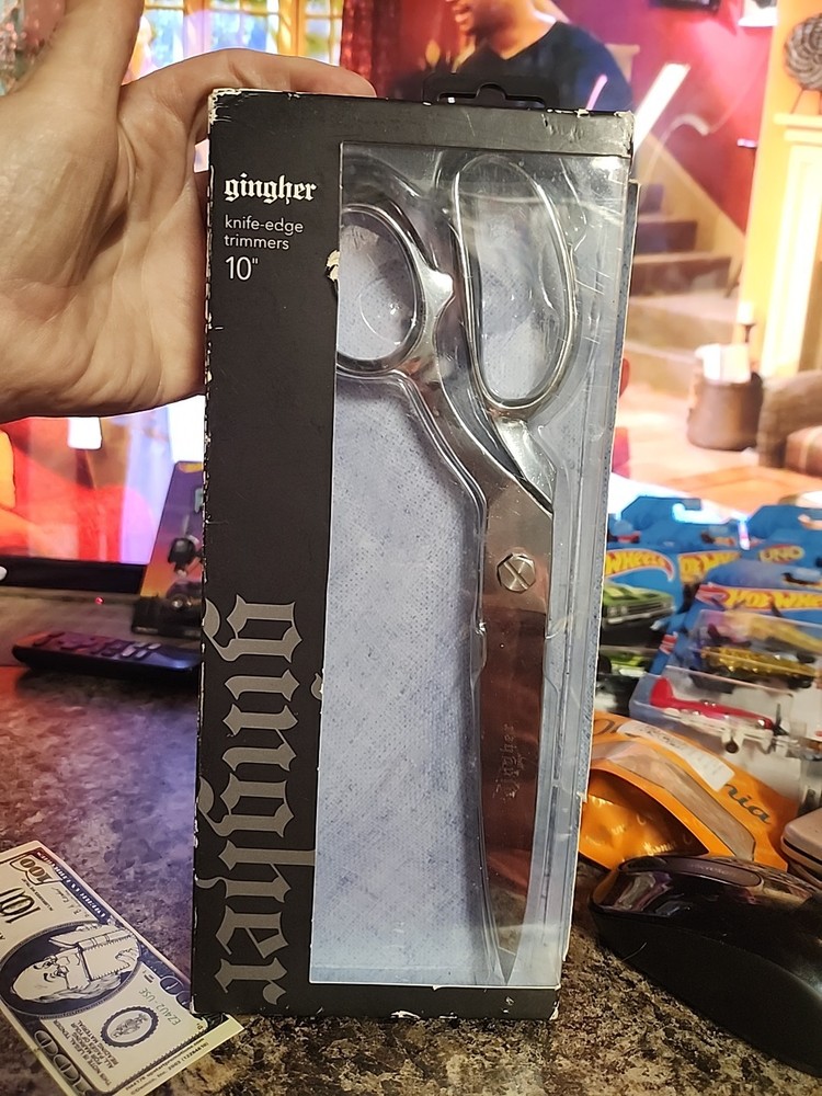Gingher 10-inch knife-edge trimmers.