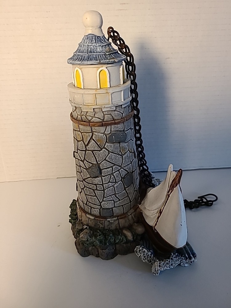 Graystone Lighthouse Sailboat And Waves With Hanging Chain