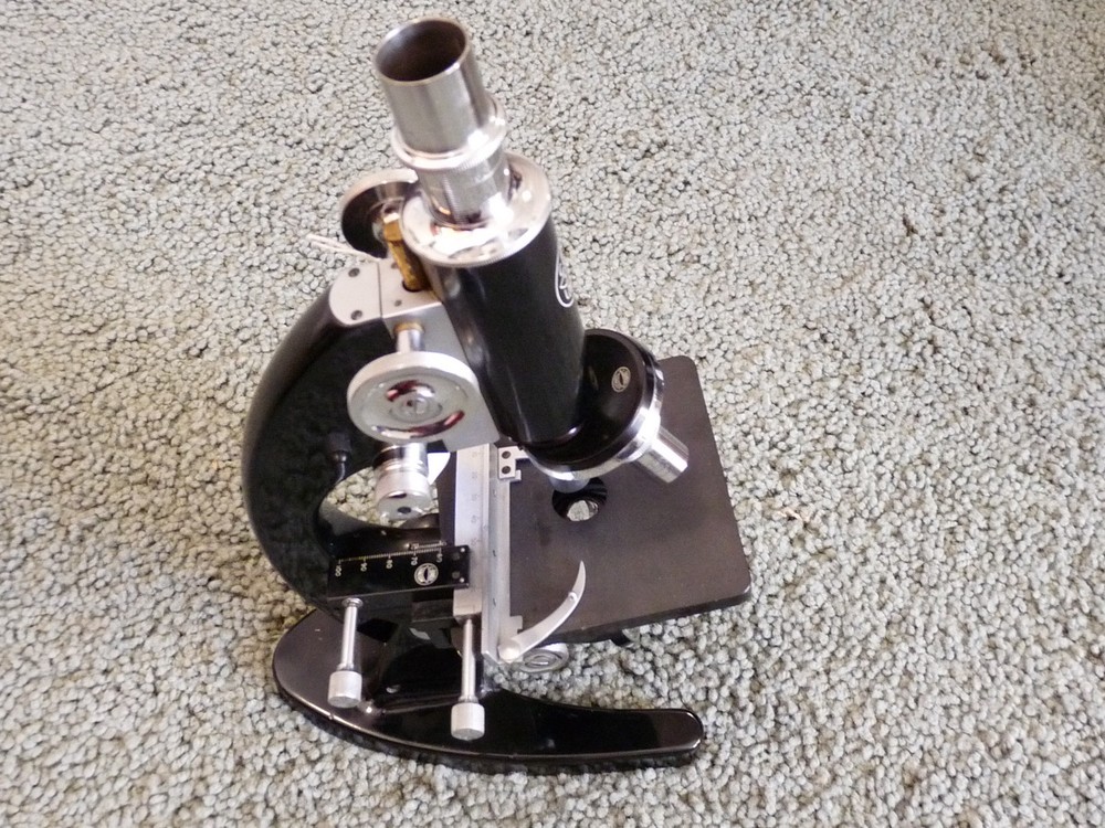 BAKER MICROSCOPE W CASE AND LENSES 4- 879