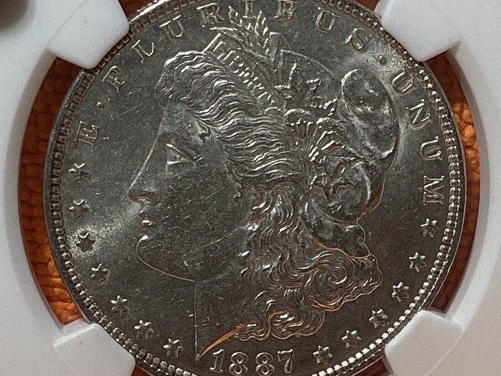1887 MORGAN SILVER 💰 NGC MS61