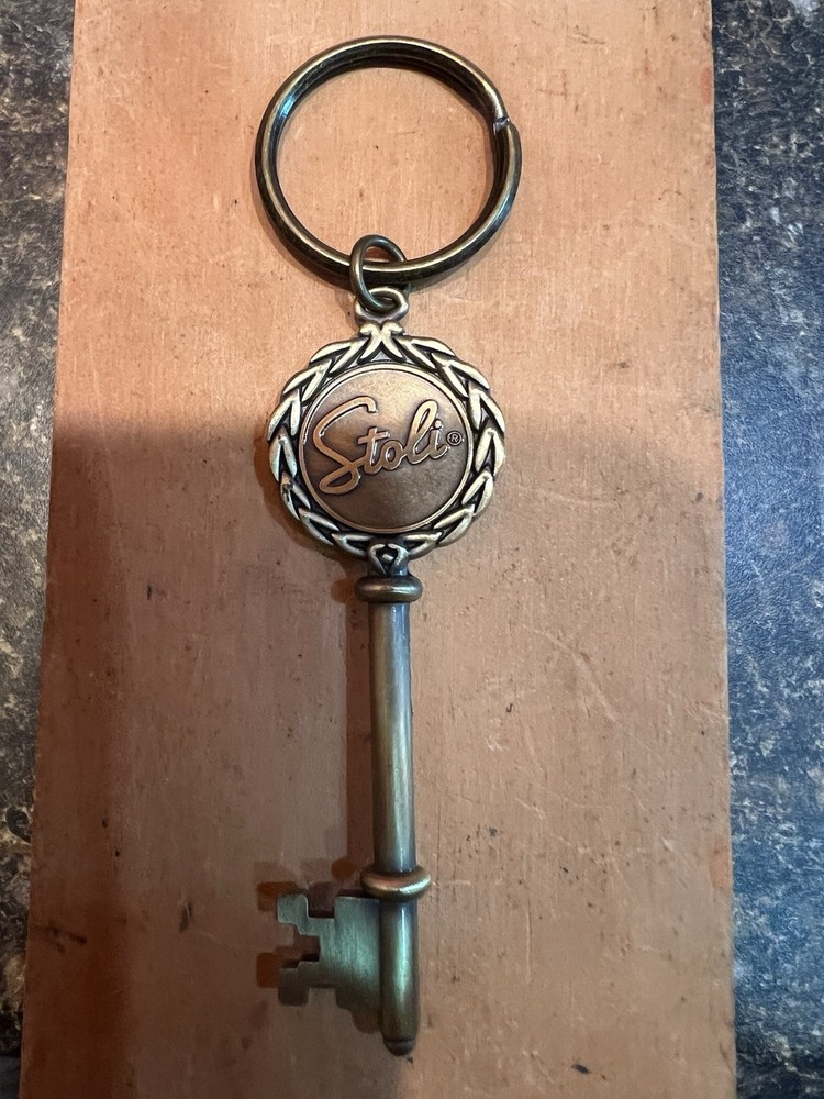 Stoli Stolichnaya Vodka Brass Keychain 4.5” (approximately)