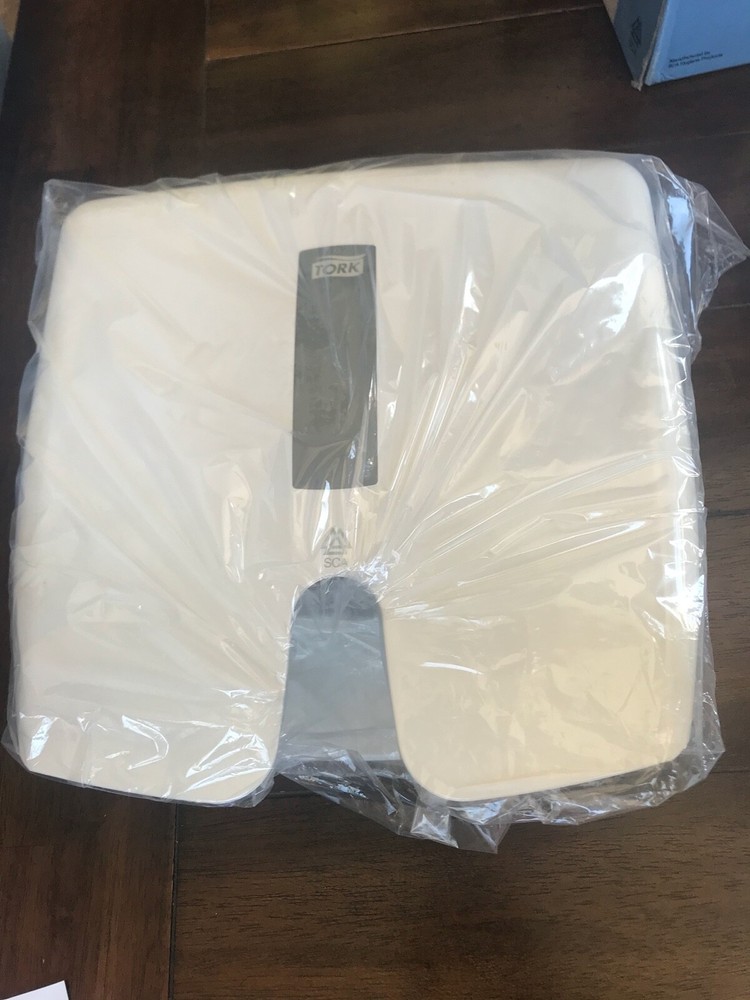 The Tork Xpress® Box Mini Hand Towel Dispenser