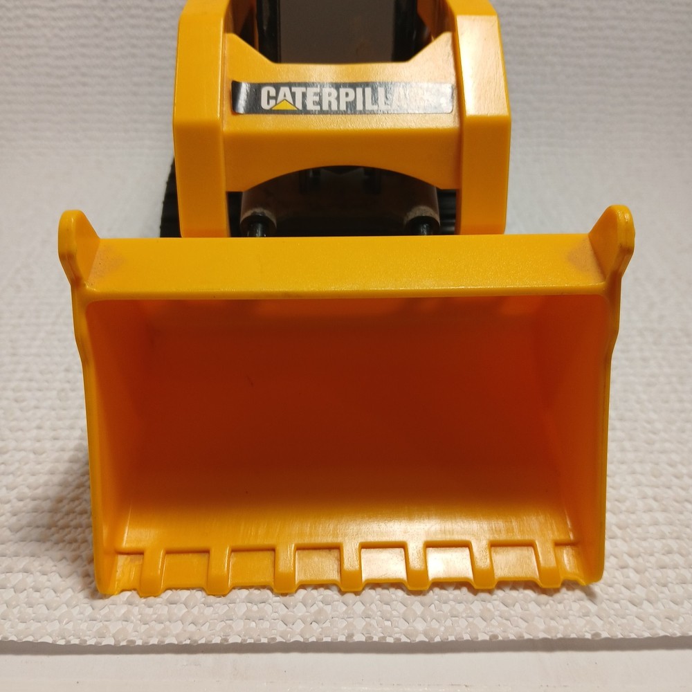 Caterpillar (CAT) toy skid steer loader, likely a "Big Builder". UNTESTED