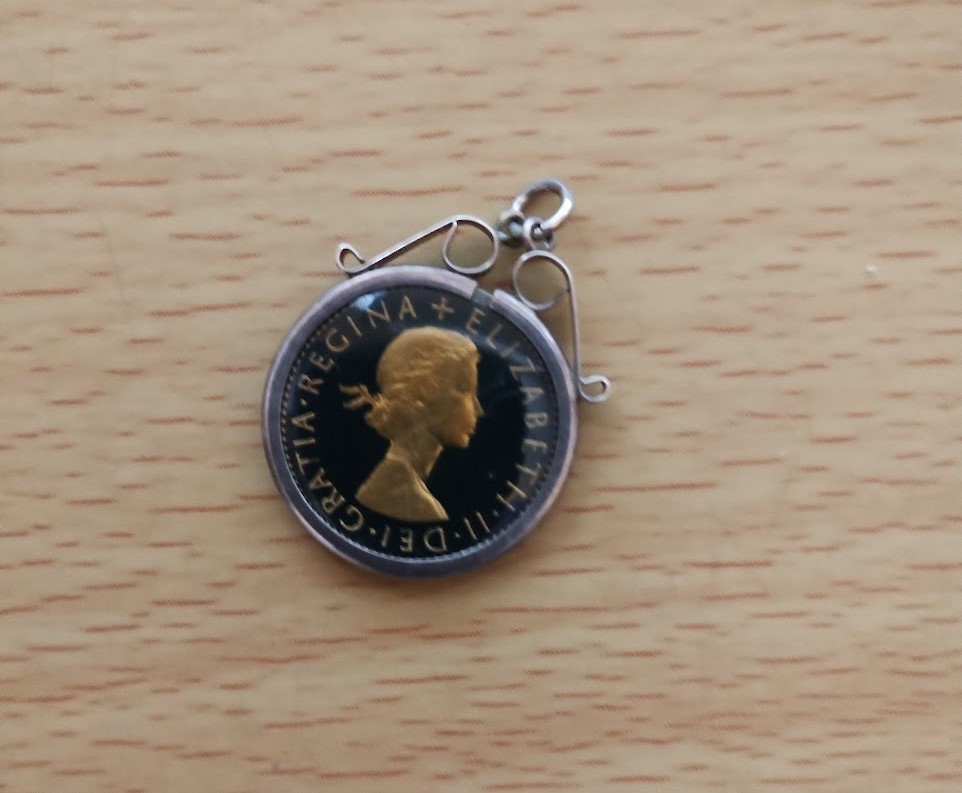 1967 sixpence Silver mounted.