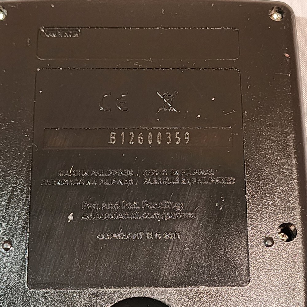 Texas Instruments TI-83 Plus Graphing Calculator With Case