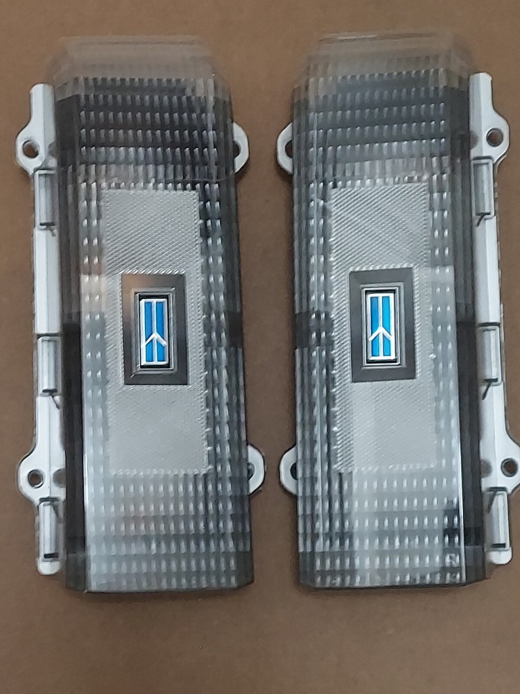 1984 to 1988 Oldsmobile Cutlass Custom Clear Tail Light Set with Blue Emblems