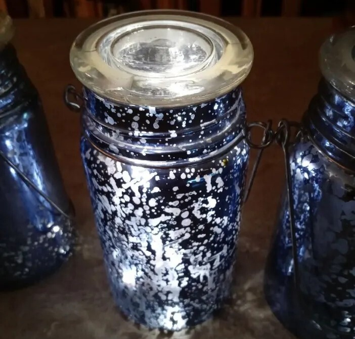 3 light up jars.