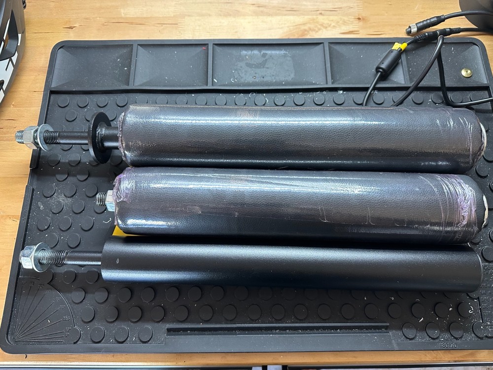 Power rack bolt on leg rollers with weight horn attachment