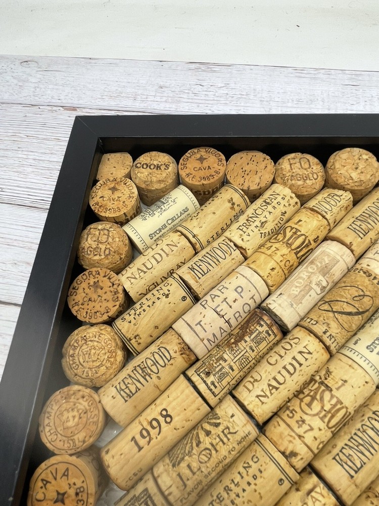 57 Assorted Wine Bottle Corks In Wood Frame 10"Tall x 10”W