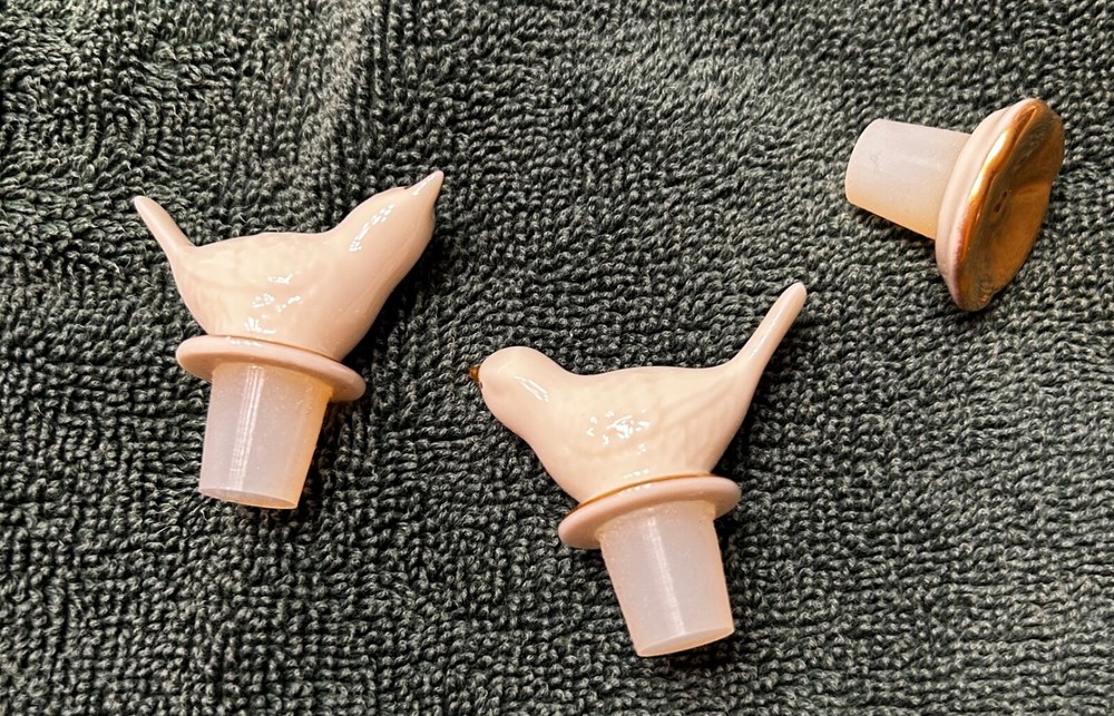 three lenox perfume stoppers