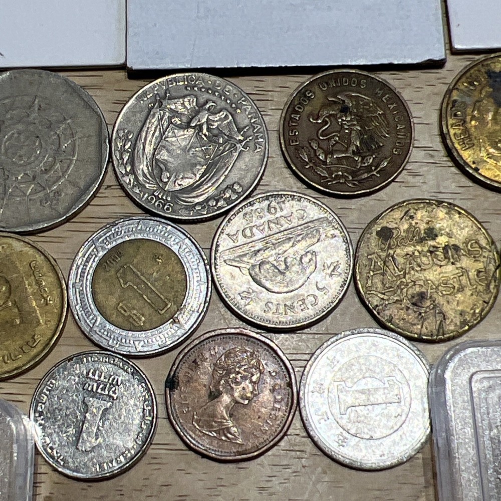 Assorted foreign and American Coins Lot. 27 Total