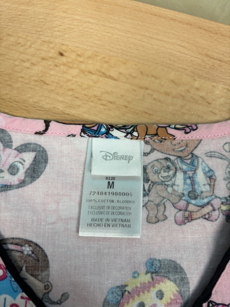 Women’s Disney Doc McStuffins Pink Scrub Top Size Medium