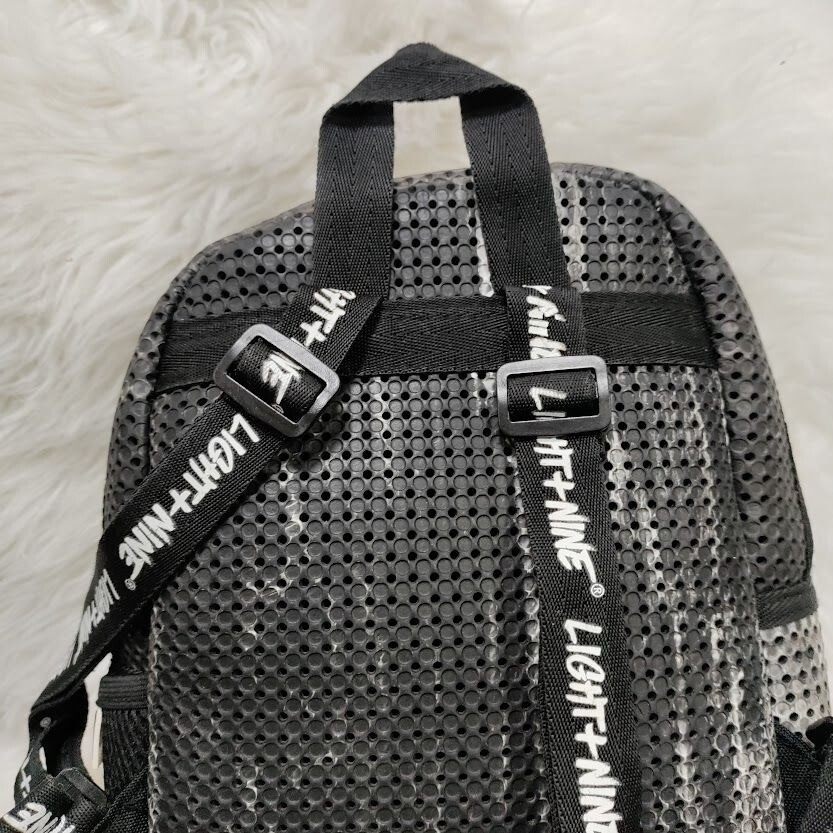 Light + Nine Little Mini Perforated Black and White Kids Backpack