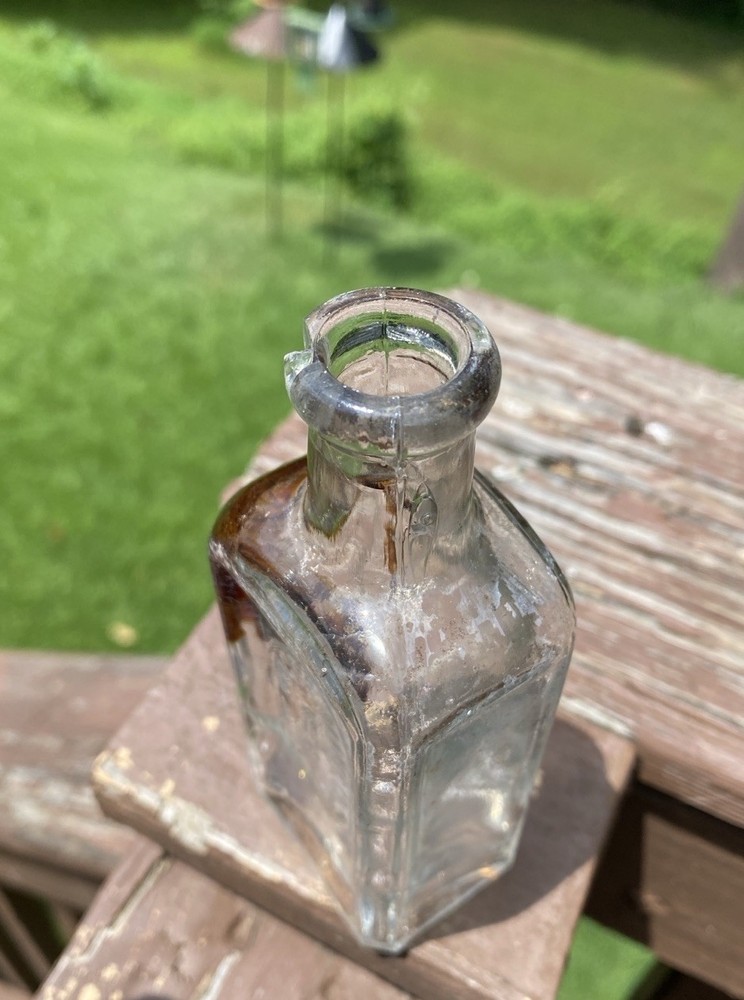 The Singer Sewing Machine Co Bottle