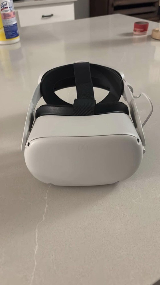 Meta quest 2 with official headset strap and case comes with controllers