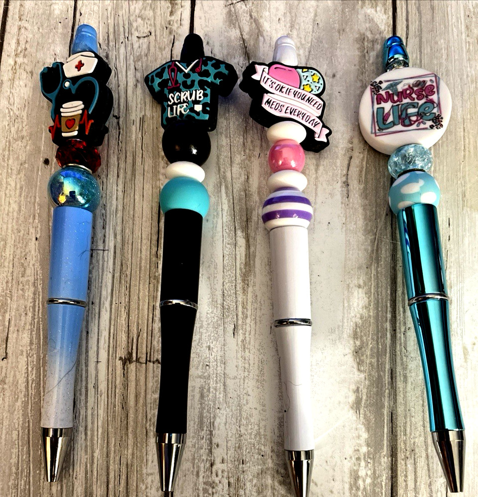 4 miscellaneous beaded pens with 1 ink refill each