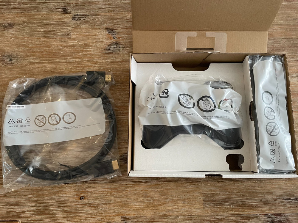 Xbox 360 Essentials Pack - Open box with new, unused controller, DVD remote