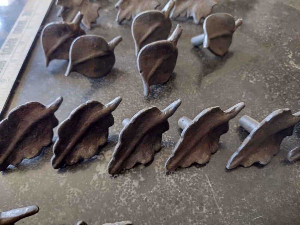 Vintage/Old 22 metal drawer pulls made by Tag - assorted Leaf Styles