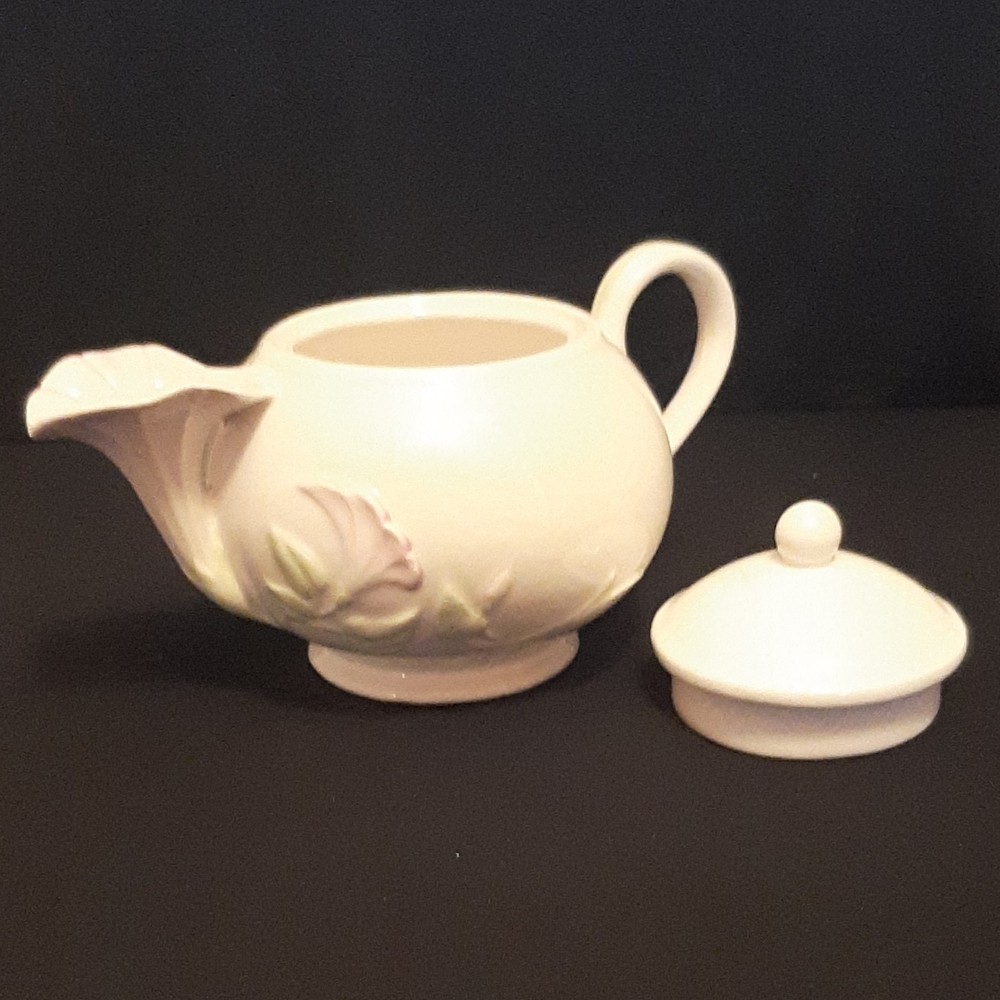 A Philippine Ivory Floral Ceramic Teapot with Lid