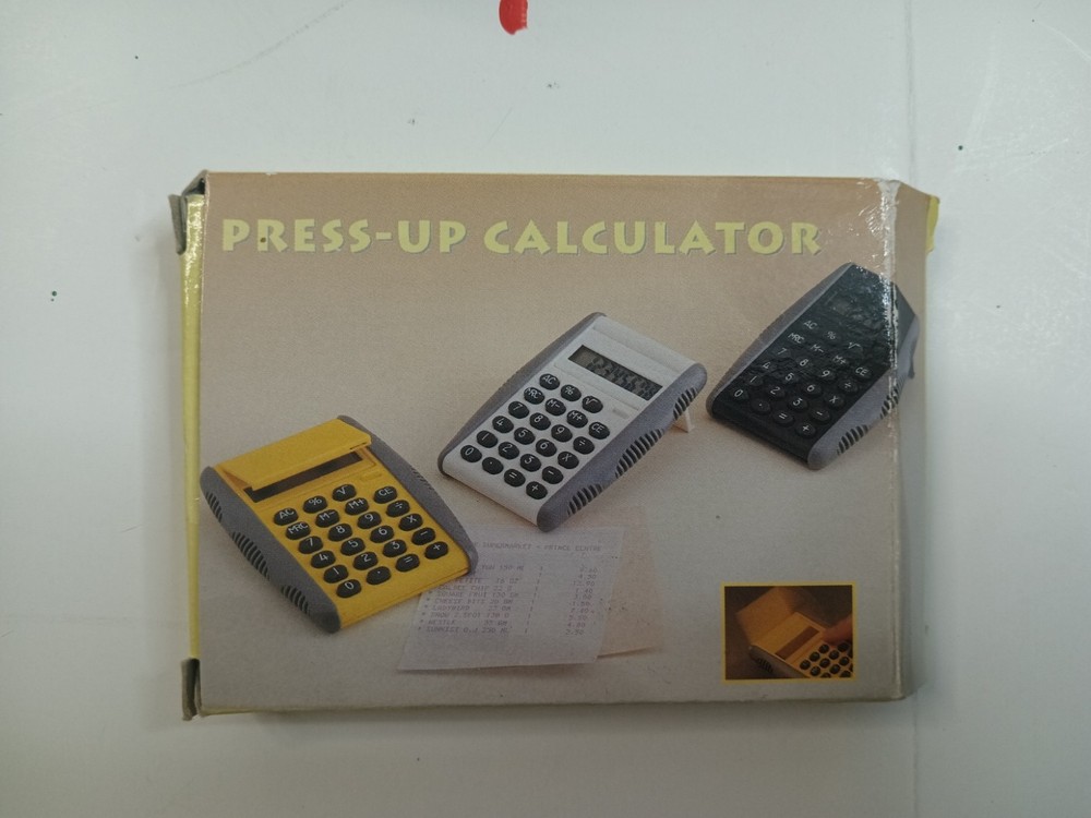 NIKON FOLDING CALCULATOR & NOTE PAD HANDHELD
