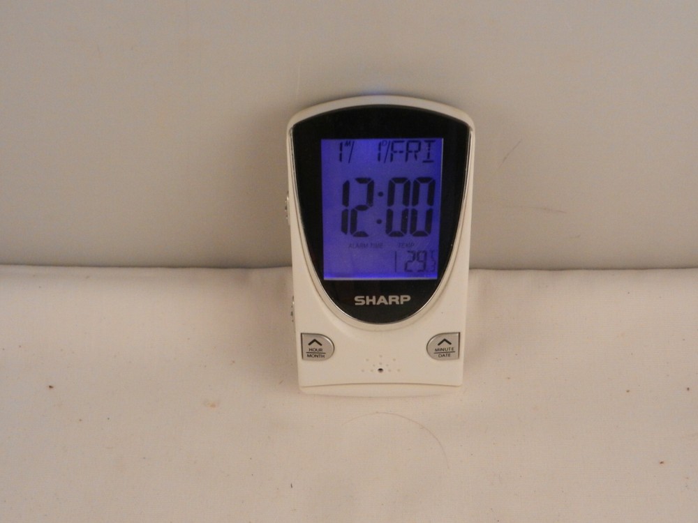 SHARP TRAVEL ALARM CLOCK "WORKS" WITH BATTERY
