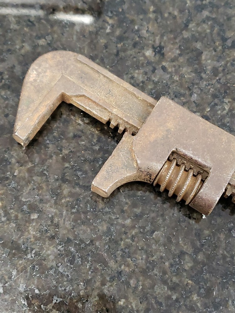 vintage pipe wrench opens to 2.5"