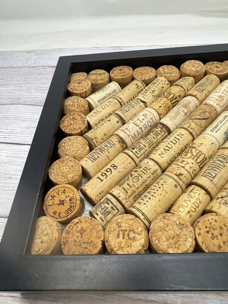 57 Assorted Wine Bottle Corks In Wood Frame 10"Tall x 10”W