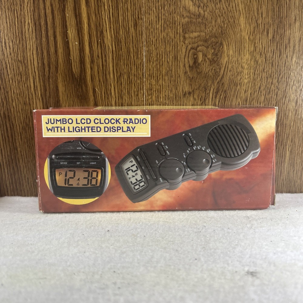 Jumbo LCD Clock Radio With Lighted Display. WORKS.