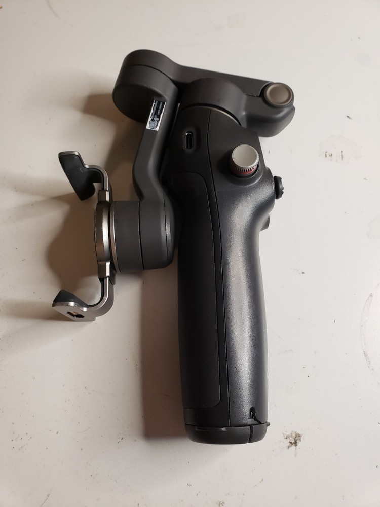 DJI Osmo Mobile 7P  Gimbal NONFUCTIONING GIMBAL - INCLUDES CLAMP - READ