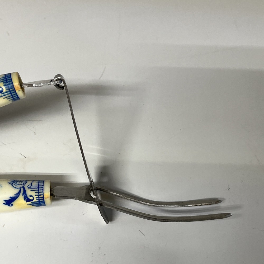 Bakelite White Blue Floral Spring Action Meat Serving Fork Slider