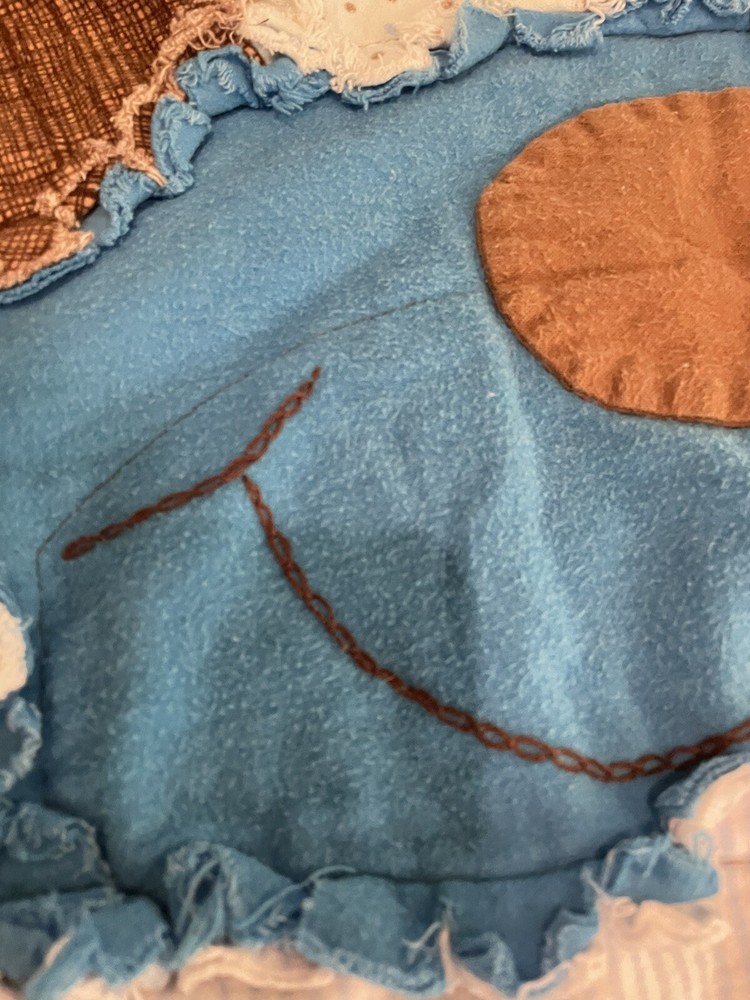 finished dog shaped rag quilt