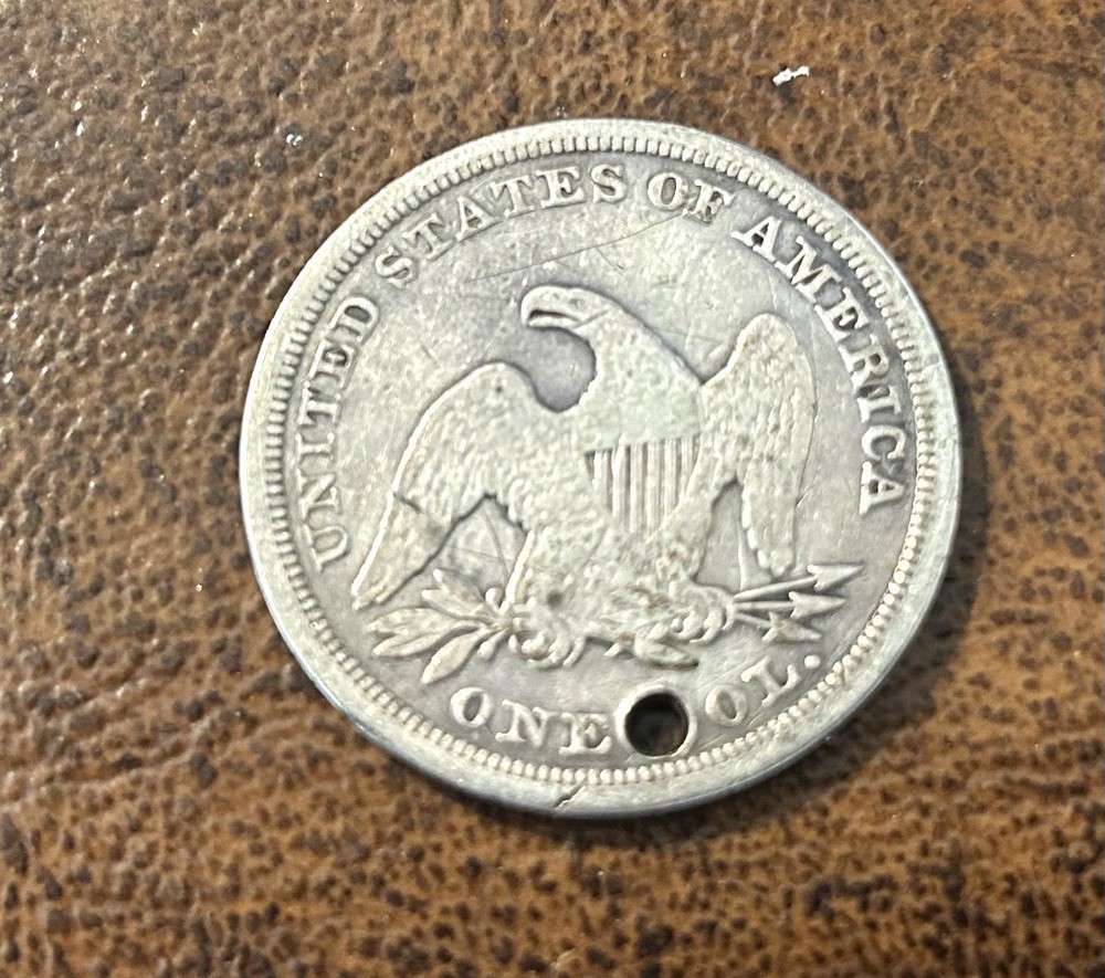 1846 seated liberty dollar /with Hole
