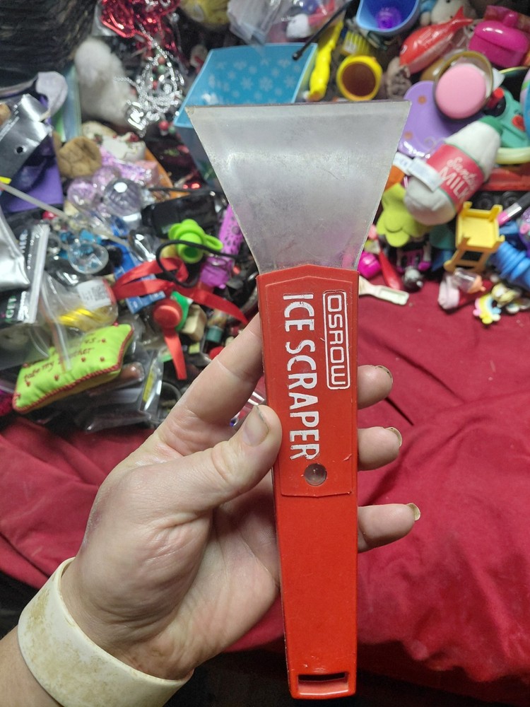 Osrow ice scraper, featuring a thick plastic blade 10" Red