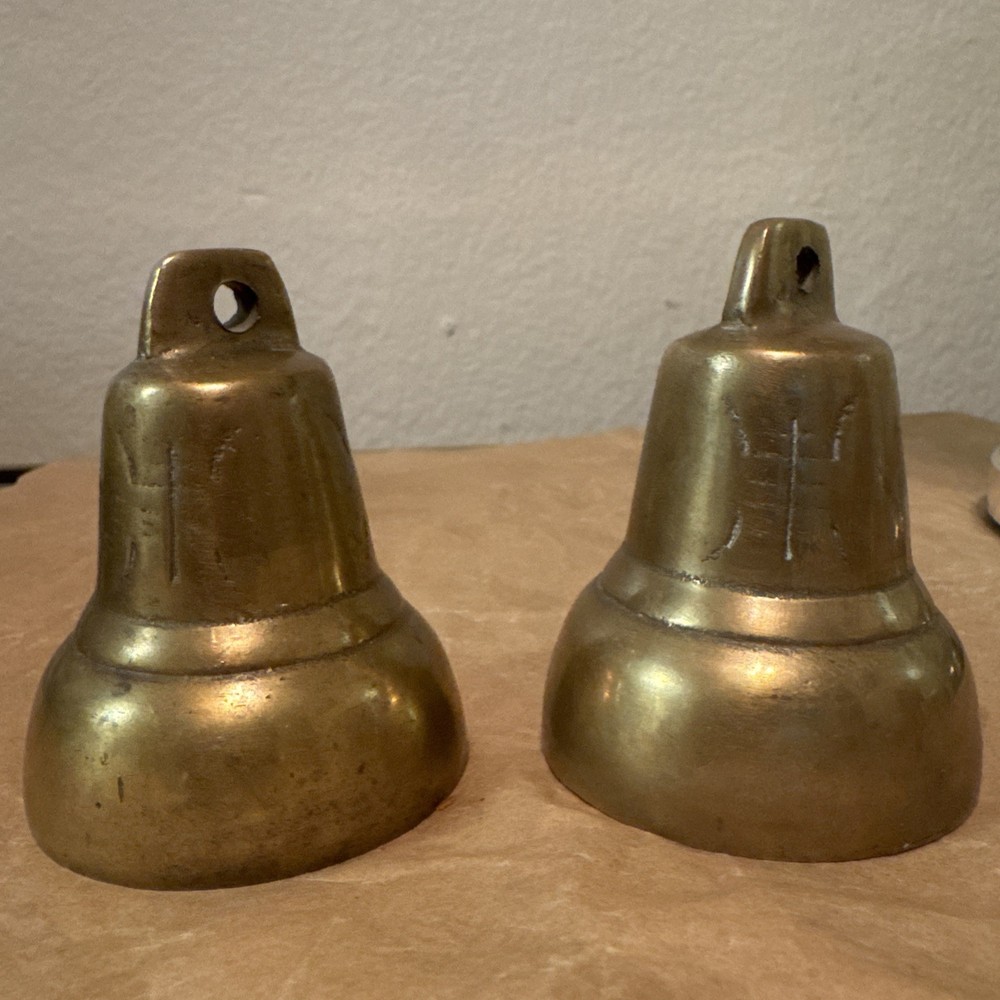 Vintage Brass bells with etchings x 2. Both missing clappers
