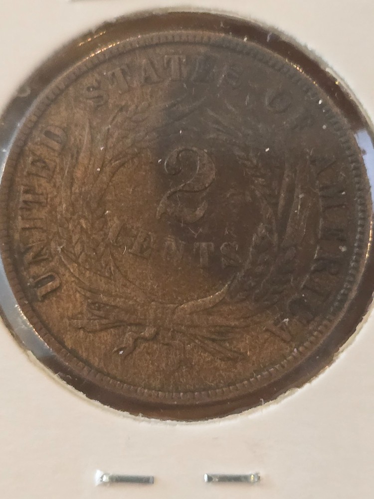 1870 2 cent piece in almost uncirculated condition