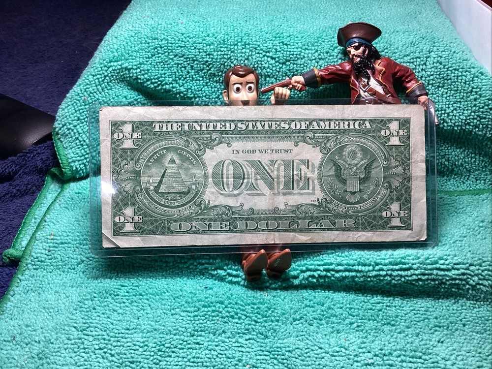 1957 A SILVER CERTIFICATE EF in RIDIG HOLDER🦅