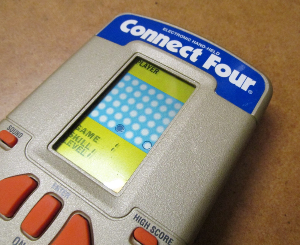 Connect Four Gold Edition Milton Bradley Electronic Handheld Game 1995