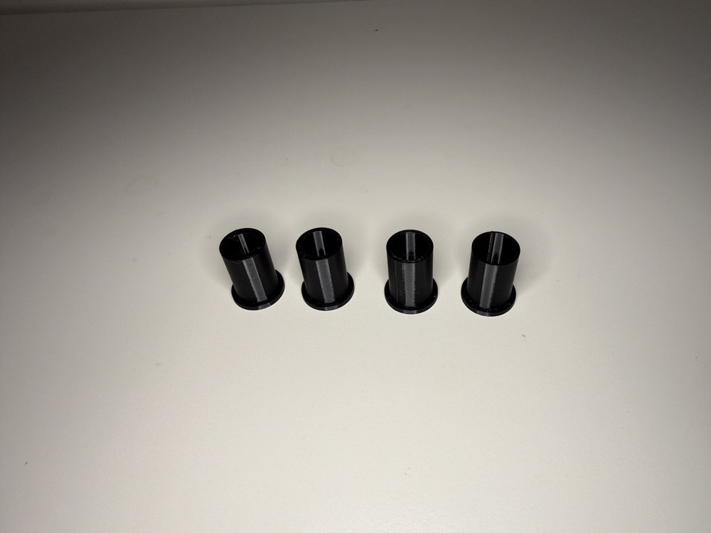 Headrest bow hanger with rubber insert