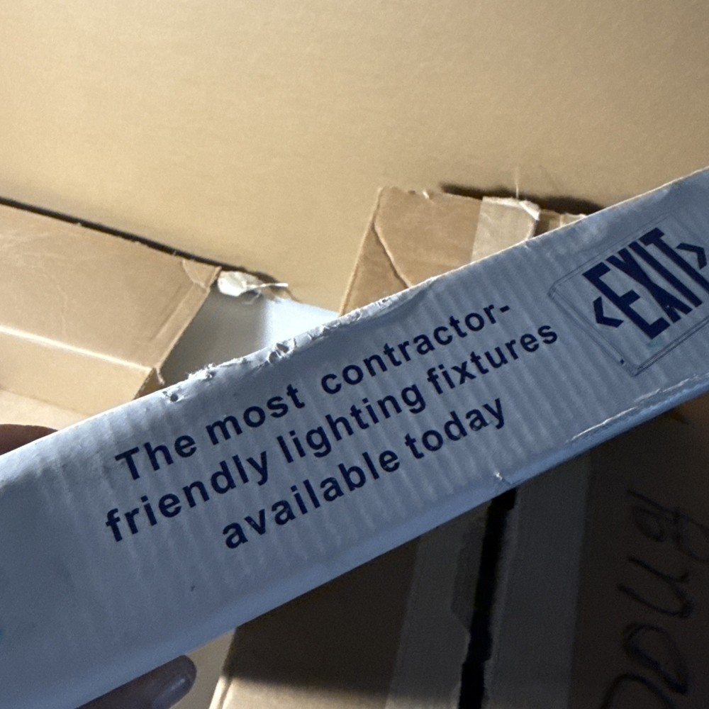 Red Light White Housing Battery Back Up Exit Sign.