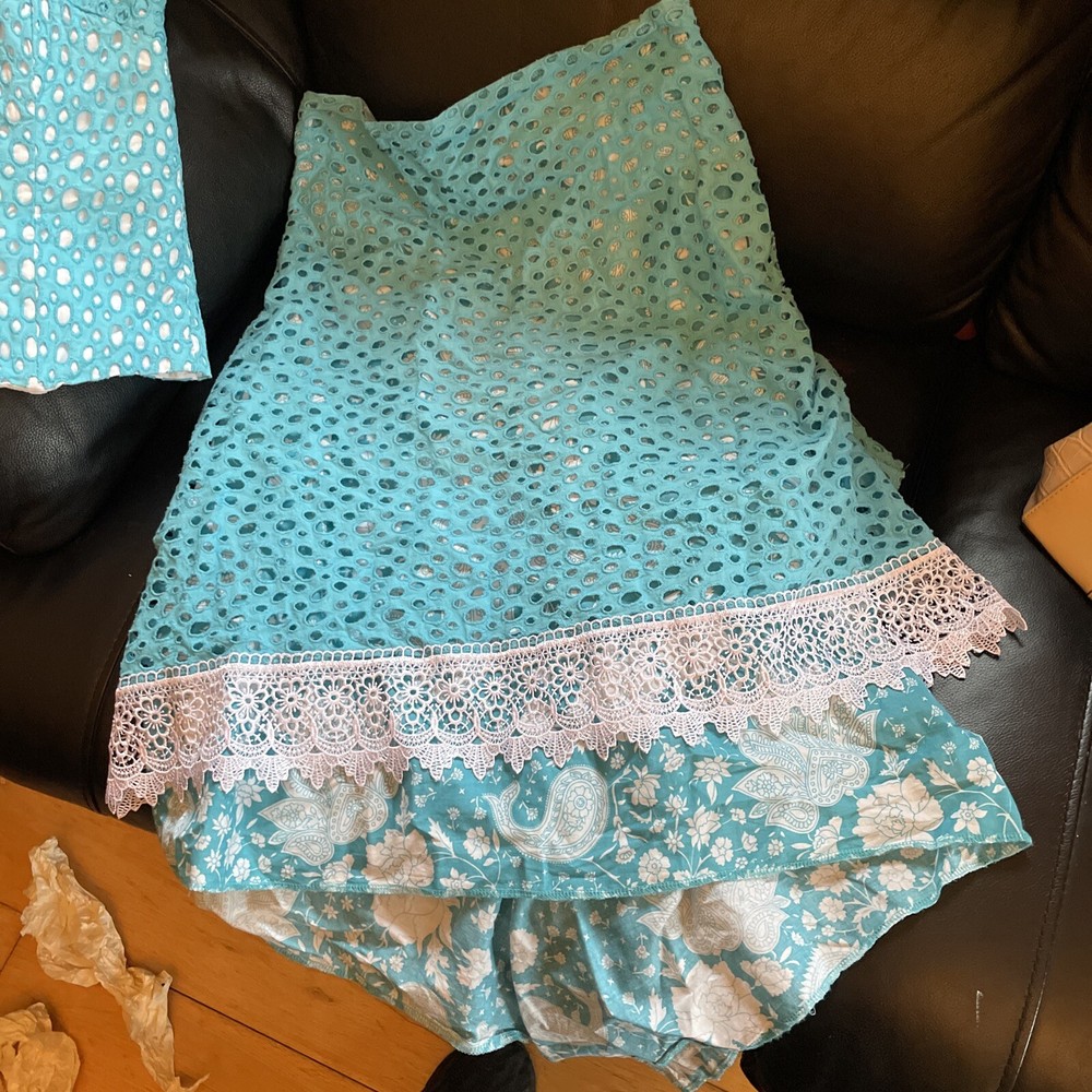 Turquoise skirt and top set size 10