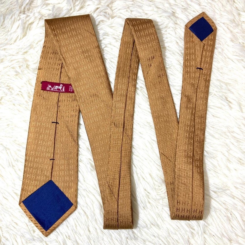 Fasone gold beige H pattern tie glossy
