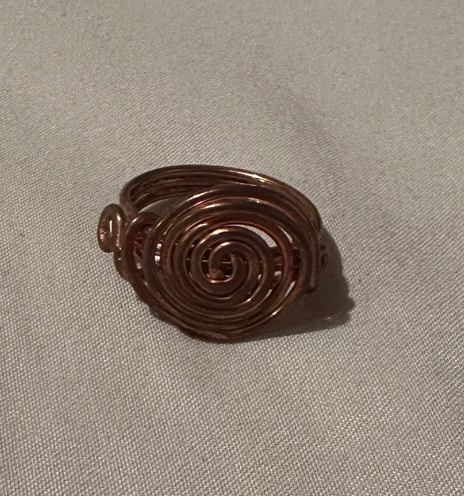 set of three rings, 2 gemstone, 1 wire, unknown specifics