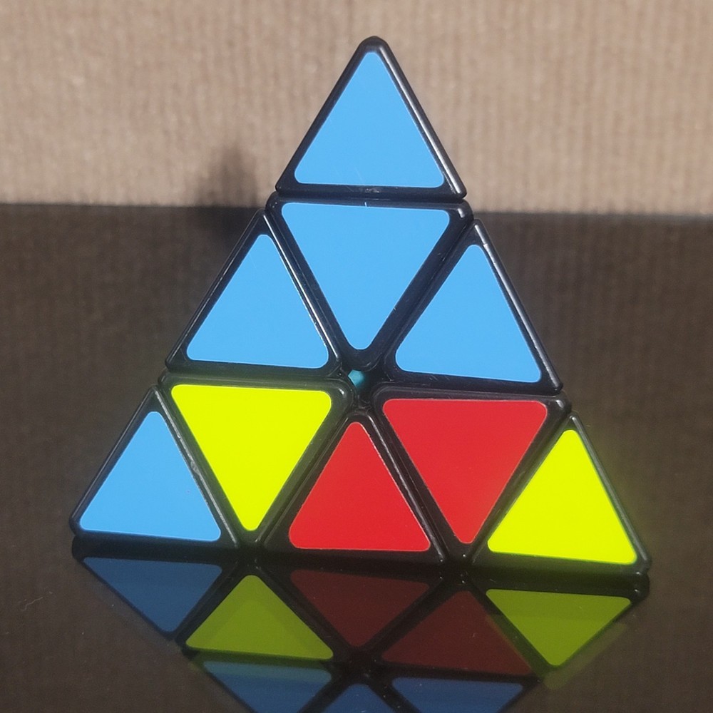 Pyramid Pyraminx Speed Cube Magic Twist 3D Puzzle Brain Teaser