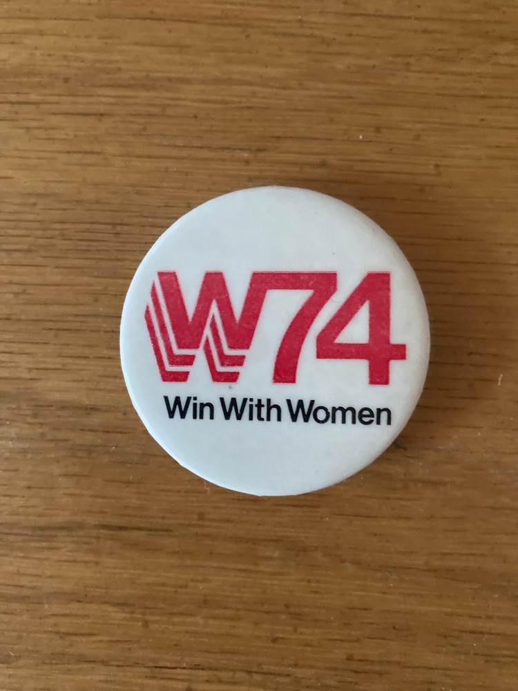 1974 Win With Women booster button