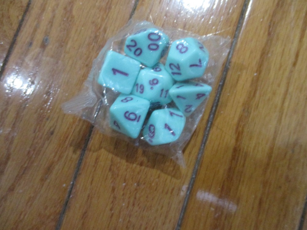 7 Piece Polyhedral Acrylic Dice Set Green w/Purple