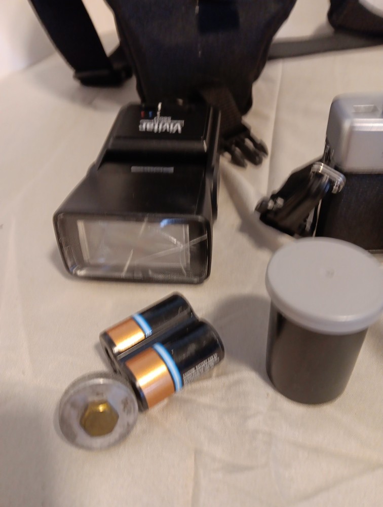 Minolta SRT 200 camera. With Accessories And Paperwork. Untested.