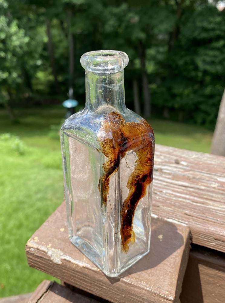 The Singer Sewing Machine Co Bottle