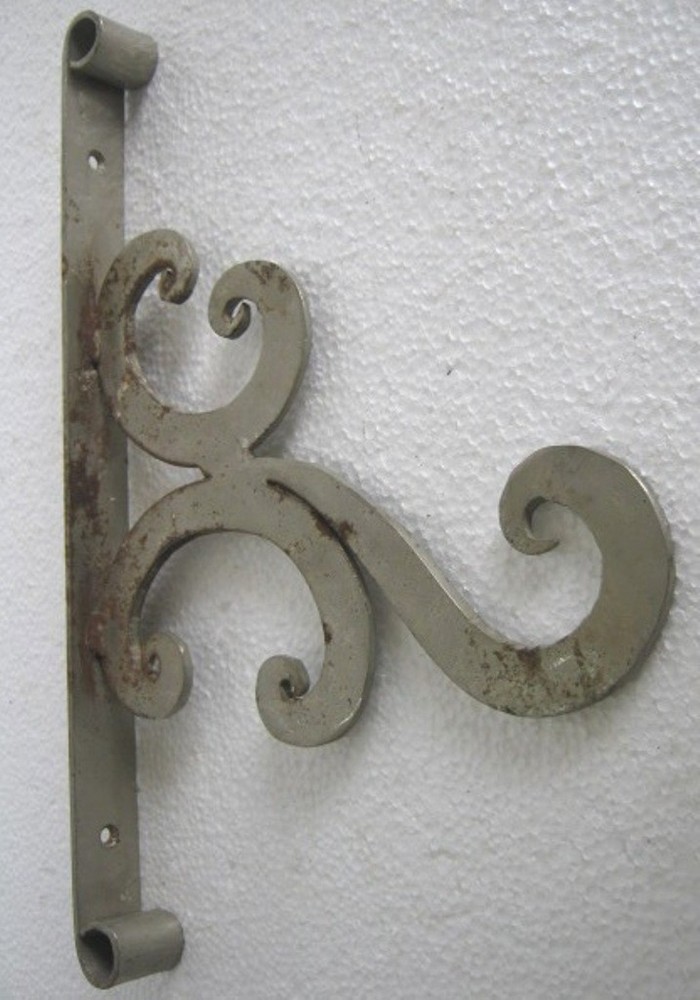 ANTIQUE VINTAGE UNUSUAL WROUGHT IRON WALL BRACKET NICKLE .