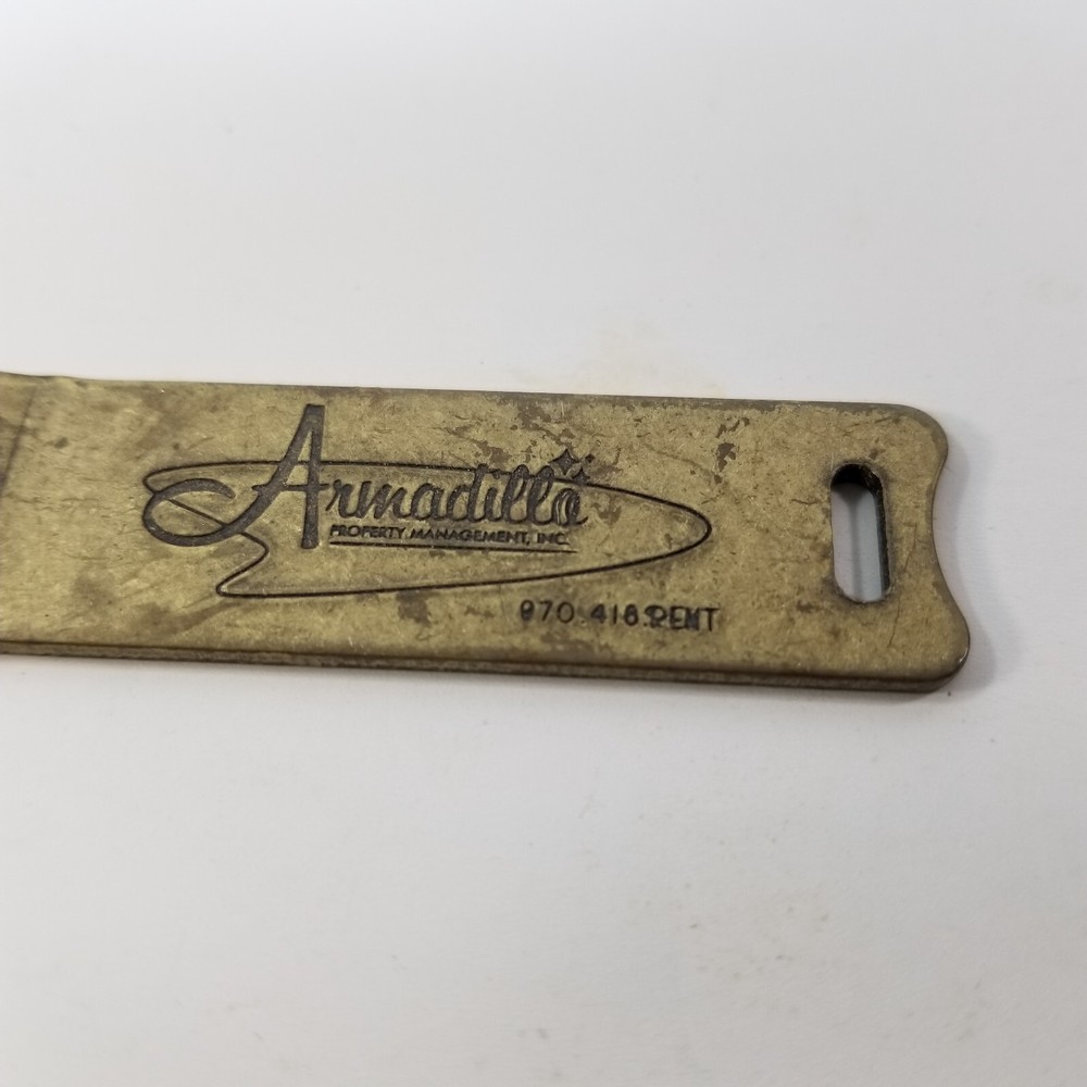 Armadillo Property Management Golf Divot Tool